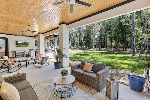 view of patio / terrace with an outdoor living space and a ceiling fan