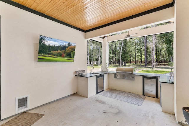 view of patio with a sink, a grill, area for grilling, a ceiling fan, and visible vents