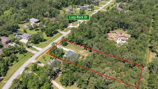 aerial view featuring a view of trees