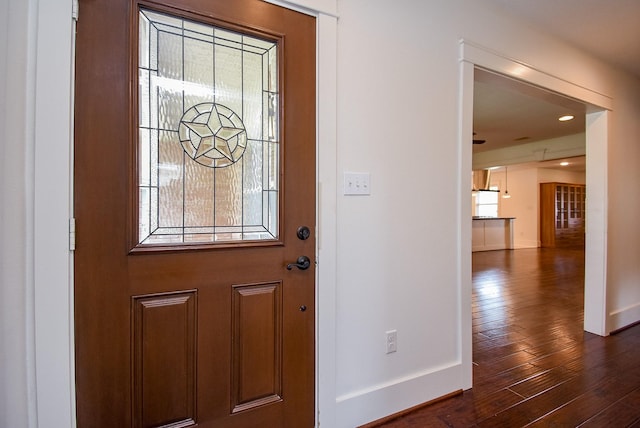 1406 Foxwood Rd, Houston, TX 77008 - entryway with baseboards and dark wood-style flooring