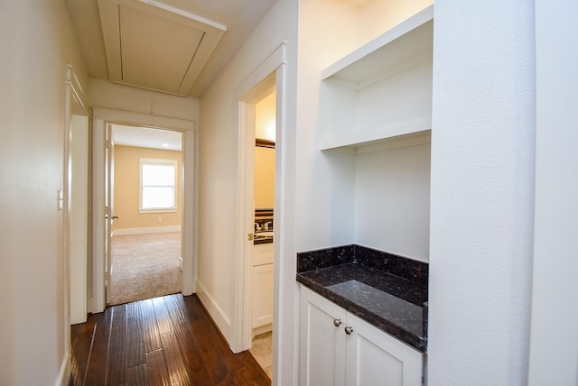 1406 Foxwood Rd, Houston, TX 77008 - corridor featuring baseboards, attic access, and dark wood finished floors