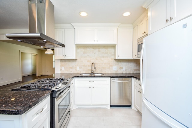 1406 Foxwood Rd, Houston, TX 77008 - kitchen with white cabinets, appliances with stainless steel finishes, a sink, and range hood