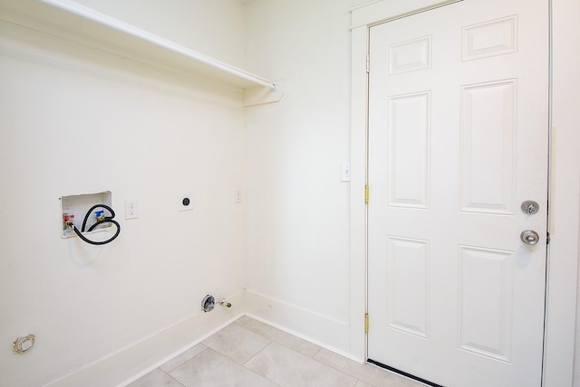 1406 Foxwood Rd, Houston, TX 77008 - washroom featuring light tile patterned flooring, laundry area, hookup for a washing machine, hookup for a gas dryer, and baseboards