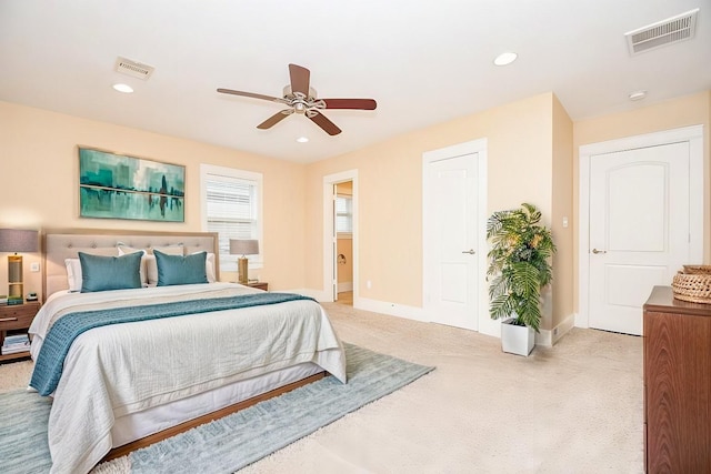 1406 Foxwood Rd, Houston, TX 77008 - bedroom featuring visible vents, a ceiling fan, baseboards, and light carpet