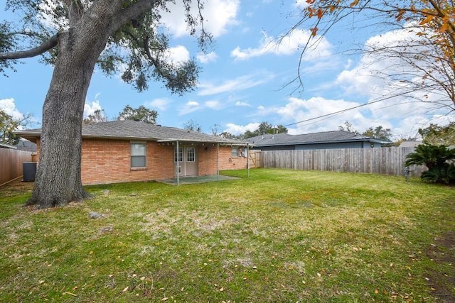 1406 Foxwood Rd, Houston, TX 77008 - view of yard with central AC, a fenced backyard, and a patio area
