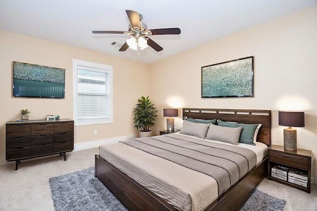 1406 Foxwood Rd, Houston, TX 77008 - bedroom with ceiling fan, visible vents, baseboards, and carpet