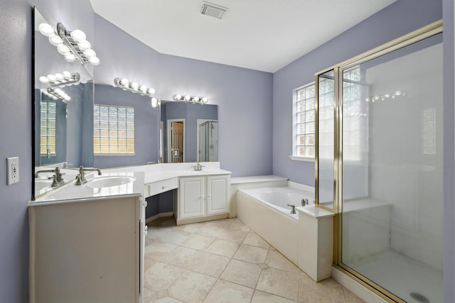 11030 Sprucedale Ct, Houston, TX 77070 - full bath featuring plenty of natural light, a garden tub, a stall shower, and tile patterned floors
