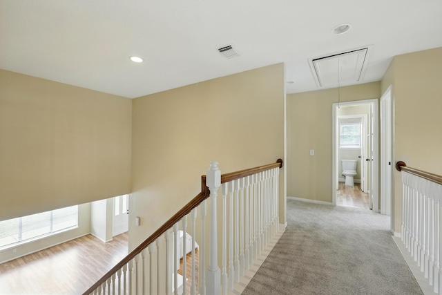 11030 Sprucedale Ct, Houston, TX 77070 - corridor featuring attic access, an upstairs landing, recessed lighting, baseboards, and carpet