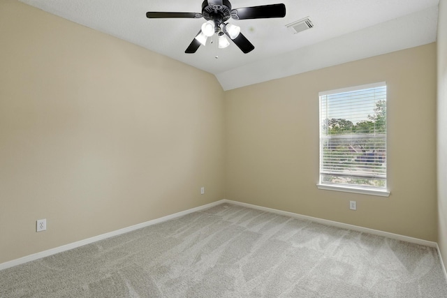 11030 Sprucedale Ct, Houston, TX 77070 - unfurnished room with light carpet, baseboards, a ceiling fan, and vaulted ceiling