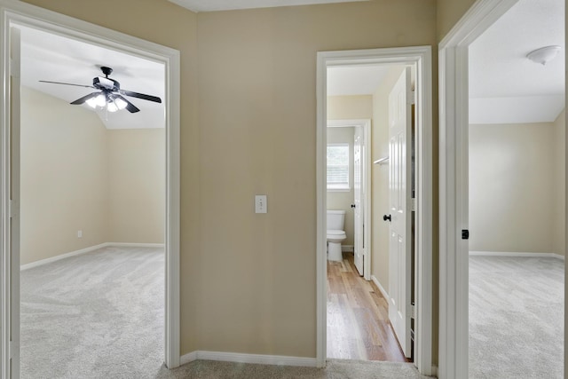 11030 Sprucedale Ct, Houston, TX 77070 - corridor with carpet, baseboards, and lofted ceiling