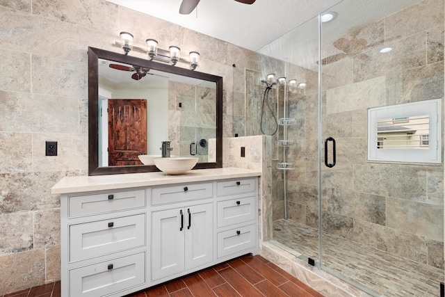 230009 Kama Dr, Porter, TX 77365 - bathroom with vanity, ceiling fan, and a shower stall