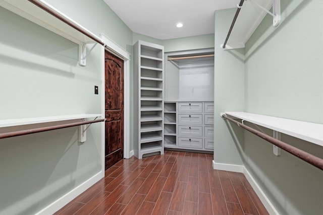 230009 Kama Dr, Porter, TX 77365 - walk in closet with dark wood-style floors