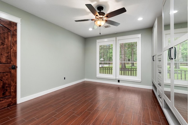 230009 Kama Dr, Porter, TX 77365 - spare room featuring dark wood-style flooring, a ceiling fan, baseboards, and recessed lighting
