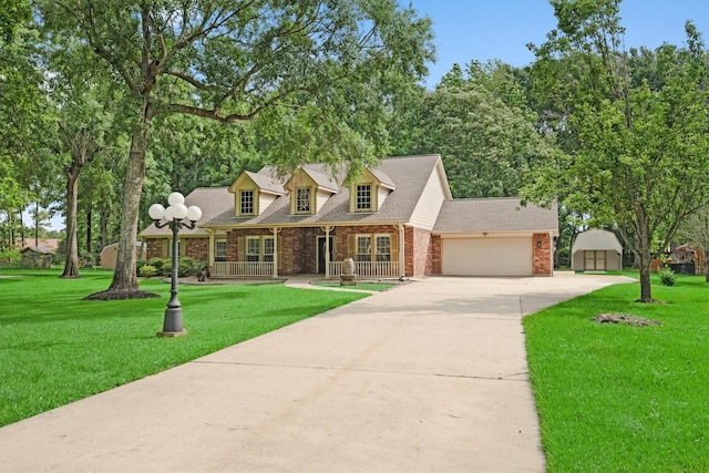 230009 Kama Dr, Porter, TX 77365 - cape cod home featuring concrete driveway, brick siding, a front yard, and a garage