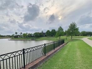 view of water feature featuring fence