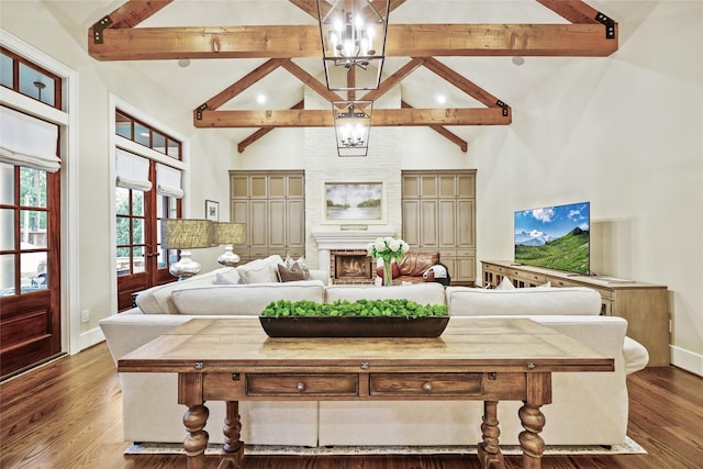 bedroom featuring an inviting chandelier, high vaulted ceiling, baseboards, wood finished floors, and beamed ceiling