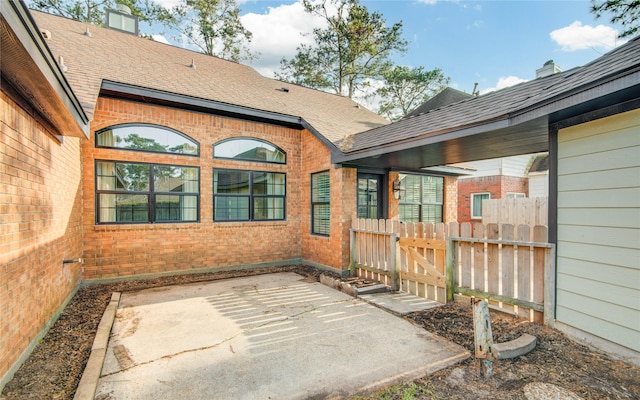 view of patio featuring fence