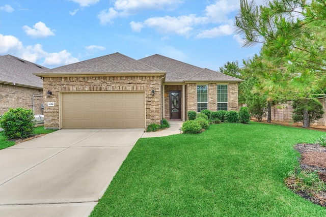 view of front facade featuring an attached garage, concrete driveway, a front lawn, and brick siding