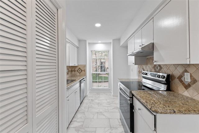 kitchen with decorative backsplash, appliances with stainless steel finishes, marble finish floor, under cabinet range hood, and recessed lighting