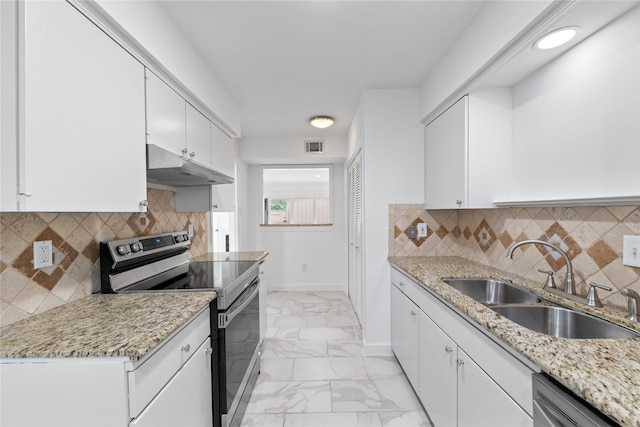 kitchen featuring a sink, white cabinets, marble finish floor, under cabinet range hood, and stainless steel appliances