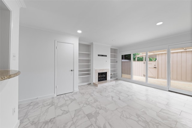unfurnished living room with ornamental molding, built in features, marble finish floor, baseboards, and recessed lighting