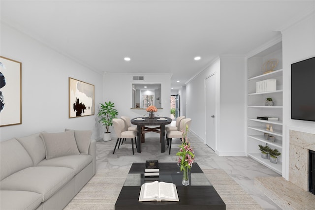 living room featuring recessed lighting, ornamental molding, marble finish floor, and built in features