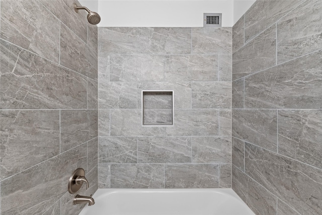 full bathroom featuring shower / bathing tub combination and visible vents