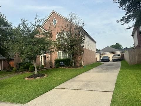 15827 Maple Shores Dr, Houston, TX 77044 - view of front of home with a detached garage