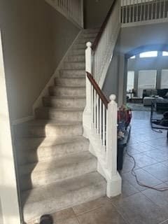 15827 Maple Shores Dr, Houston, TX 77044 - stairway featuring baseboards