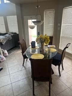 15827 Maple Shores Dr, Houston, TX 77044 - dining space with tile patterned floors