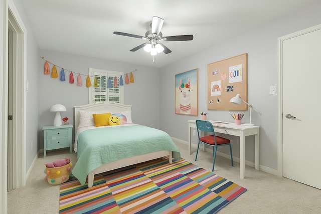 bedroom featuring carpet floors, baseboards, and ceiling fan