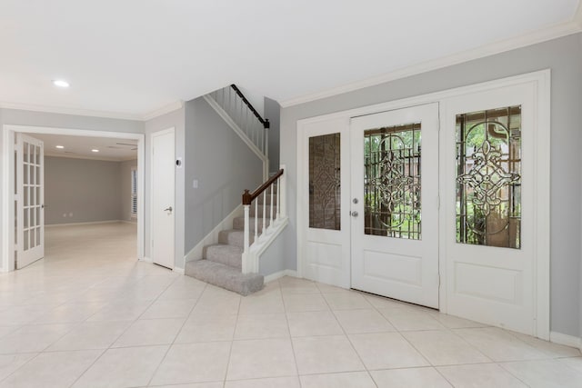 entryway featuring french doors, stairs, ornamental molding, baseboards, and recessed lighting