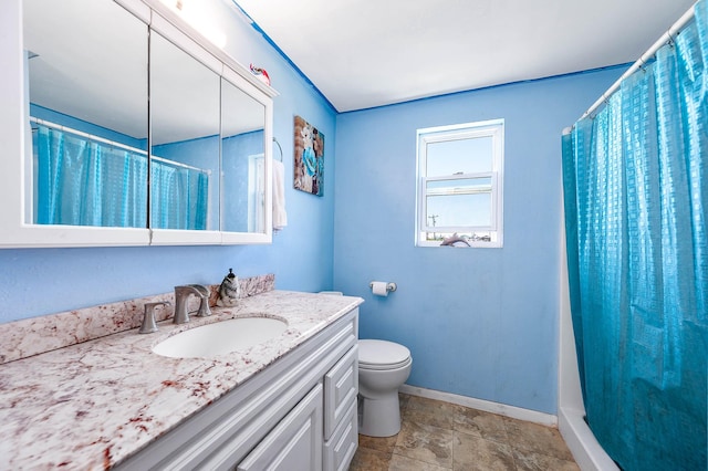437 County Road 201, Sargent, TX 77414 - full bath with toilet, baseboards, a shower with shower curtain, and vanity