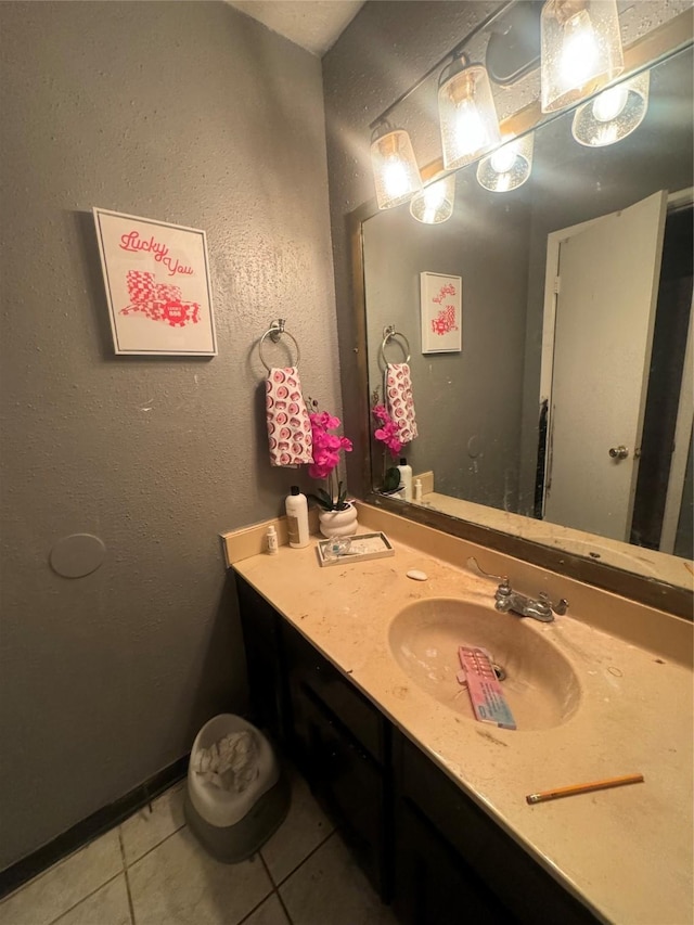 bathroom with vanity and tile patterned floors