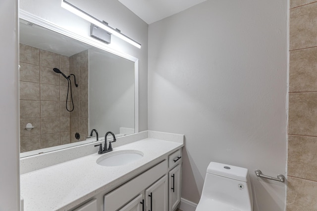 full bathroom with vanity, toilet, and a shower