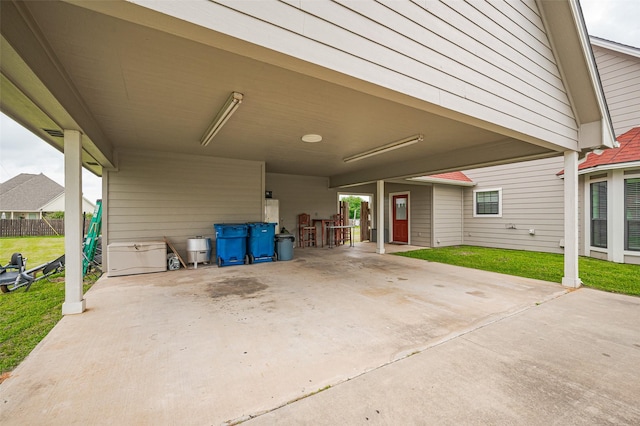 view of patio / terrace featuring an attached carport