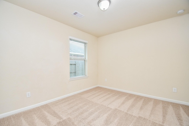 18007 Alora Springs Trce, Cypress, TX 77433 - spare room with light colored carpet, baseboards, and a smoke detector