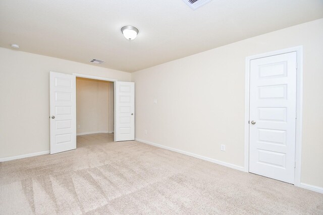 18007 Alora Springs Trce, Cypress, TX 77433 - empty room featuring light colored carpet and baseboards