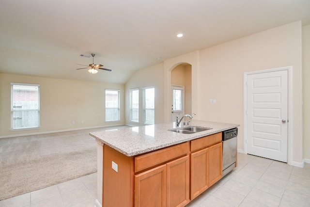 18007 Alora Springs Trce, Cypress, TX 77433 - kitchen featuring a sink, dishwasher, arched walkways, a ceiling fan, and healthy amount of natural light