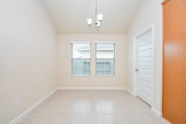 18007 Alora Springs Trce, Cypress, TX 77433 - empty room with a chandelier, vaulted ceiling, light tile patterned floors, and baseboards