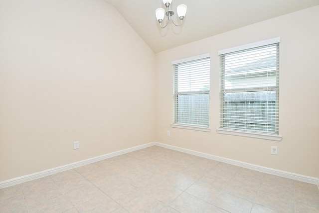 18007 Alora Springs Trce, Cypress, TX 77433 - spare room with vaulted ceiling, a chandelier, and baseboards