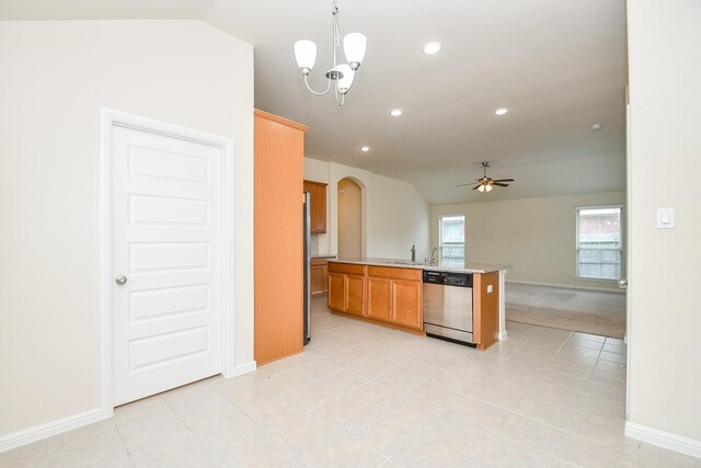 18007 Alora Springs Trce, Cypress, TX 77433 - kitchen with appliances with stainless steel finishes, arched walkways, ceiling fan, baseboards, and lofted ceiling