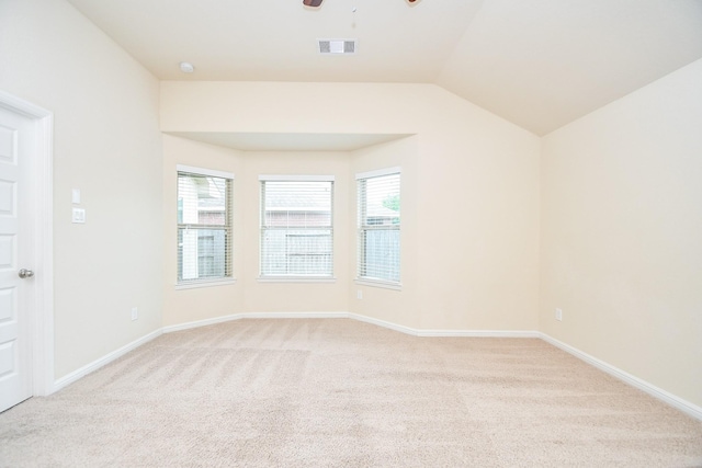18007 Alora Springs Trce, Cypress, TX 77433 - spare room with ceiling fan, light carpet, healthy amount of natural light, vaulted ceiling, and baseboards