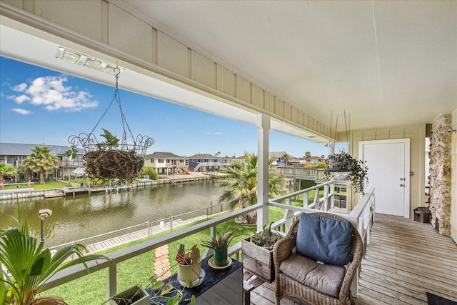 exterior space with a water view and a residential view