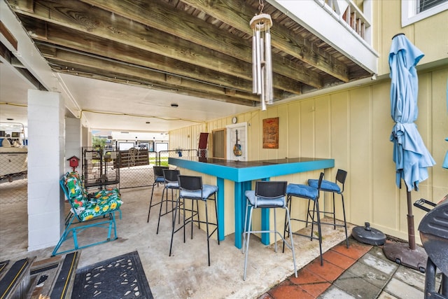 view of patio featuring outdoor dry bar