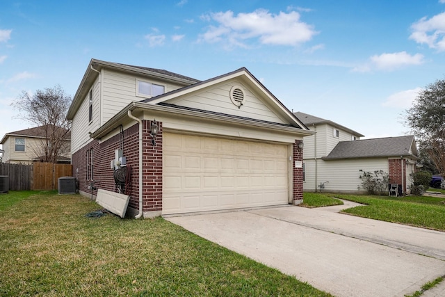 traditional home with a garage, fence, cooling unit, brick siding, and driveway