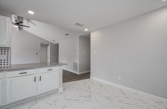 kitchen with ceiling fan, marble finish floor, recessed lighting, baseboards, and visible vents