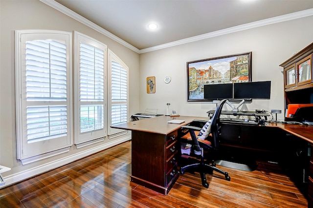 office featuring baseboards, ornamental molding, and wood finished floors