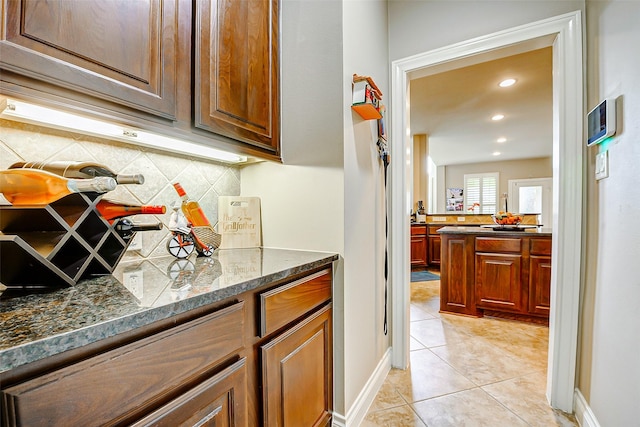 bar featuring recessed lighting, light tile patterned floors, and tasteful backsplash