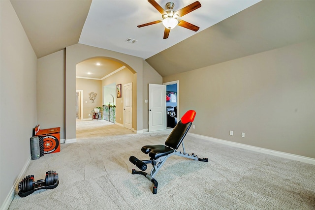 workout area with arched walkways, ceiling fan, carpet, and visible vents